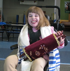 Rachel holding the Torah